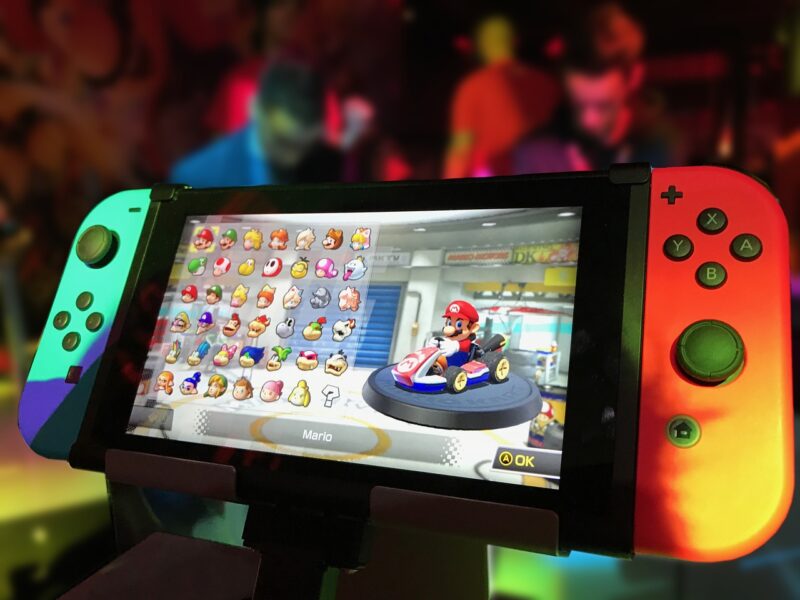A Nintendo Switch featuring the character select screen for Mario Kart 8.