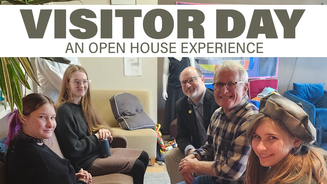 Visitor Day banner. An open house experience. Several students and guests to TNS gather for a discussion.