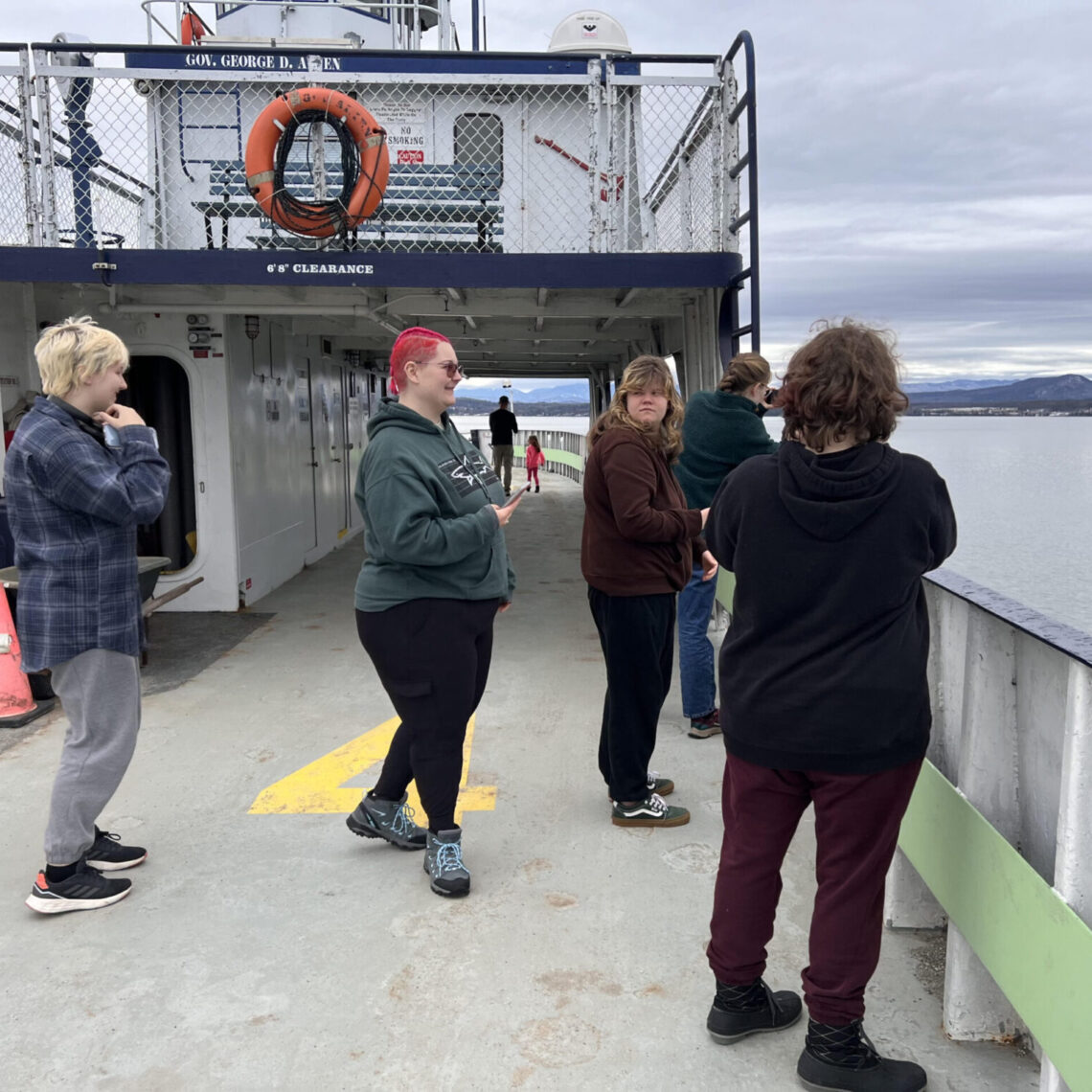 Students and staff enjoy the ferry trip across Lake Champlain.