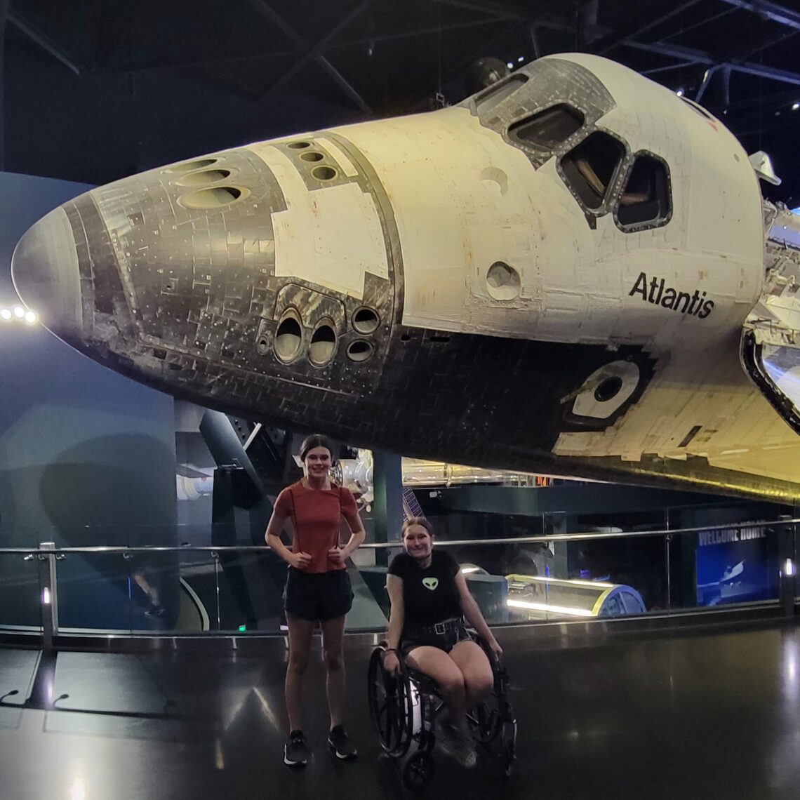 Lilly and Olie in front of Space Shuttle Atlantis