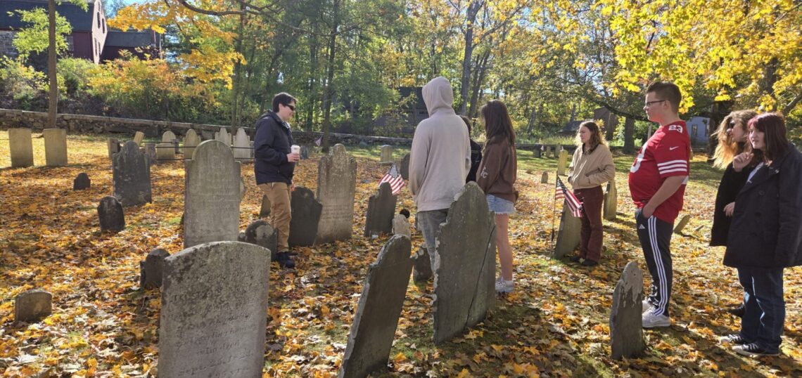 York Cemetery with students and a tour guide.