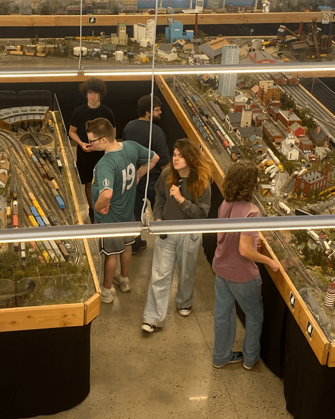 At the trolley museum, students look around.