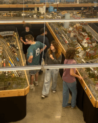 At the trolley museum, students look around.